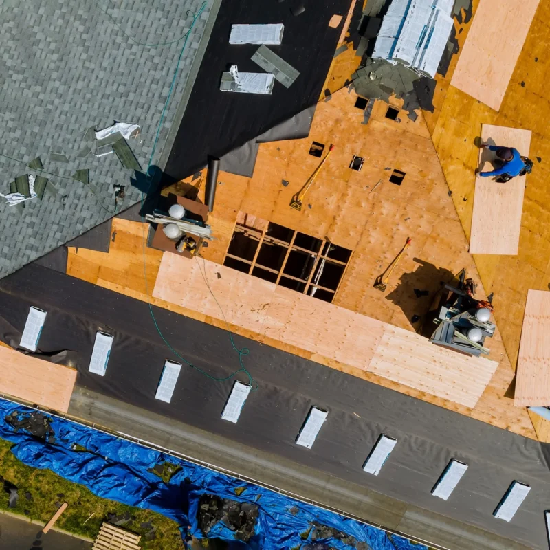 A Roofer Nailing Shingles With Air Gun Replacing 2023 11 27 05 28 21 Utc