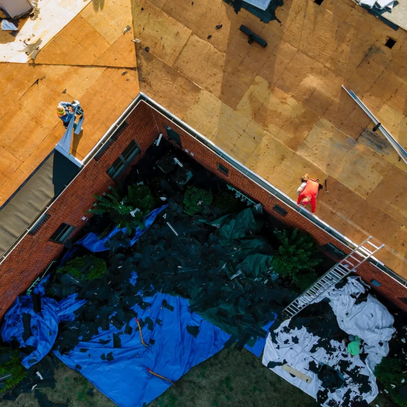 Construction Worker On A Replacement Shingles Roof 2023 11 27 04 57 09 Utc